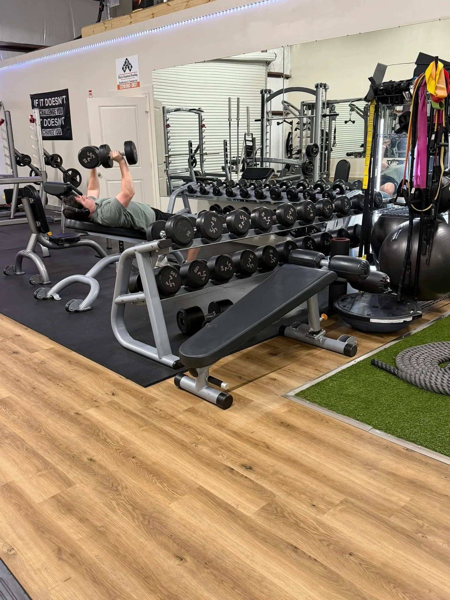 Dumbbell rack and free weight area at Tifton Fitness